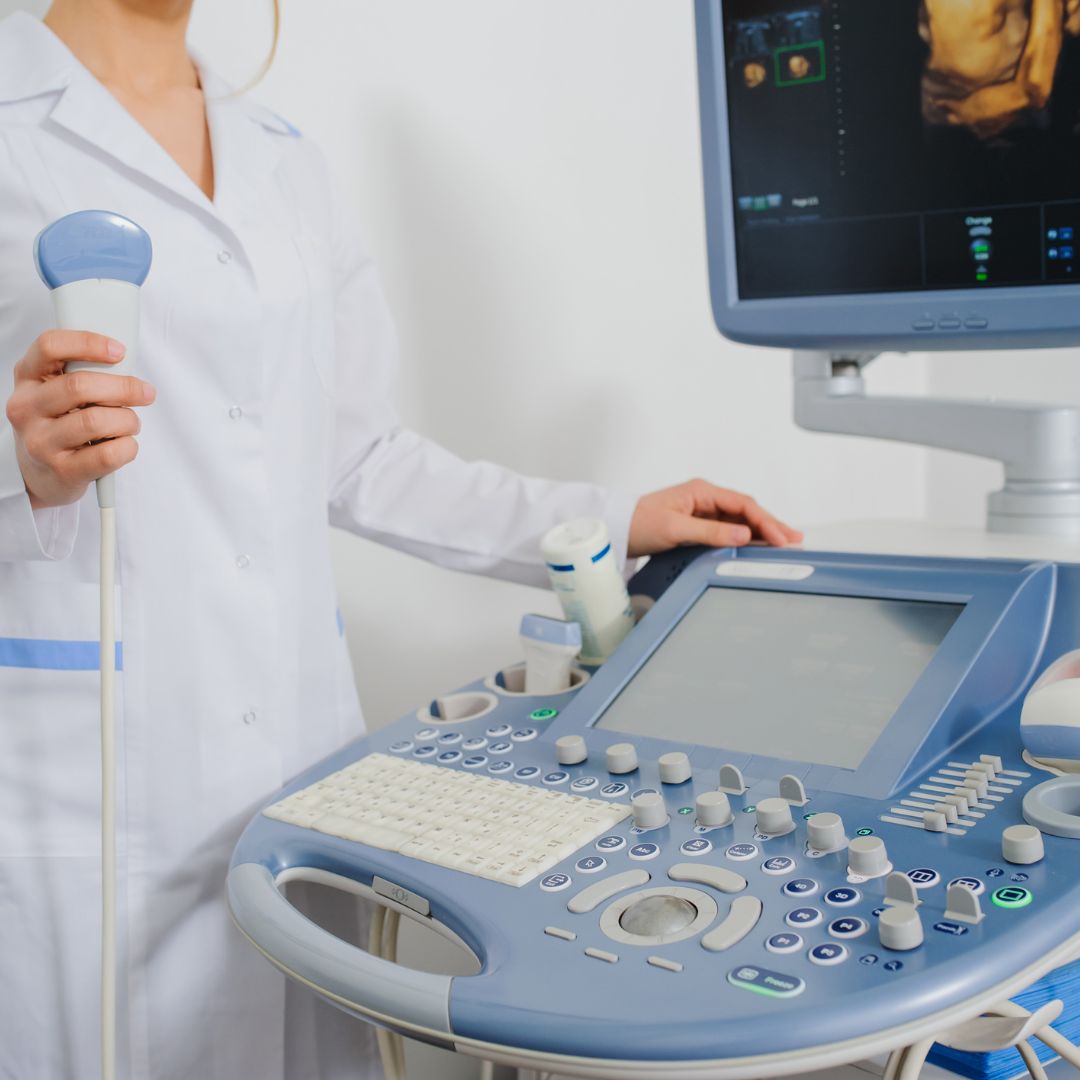 an ultrasound technician using an advanced ultrasound machine Sweet Baby Face services