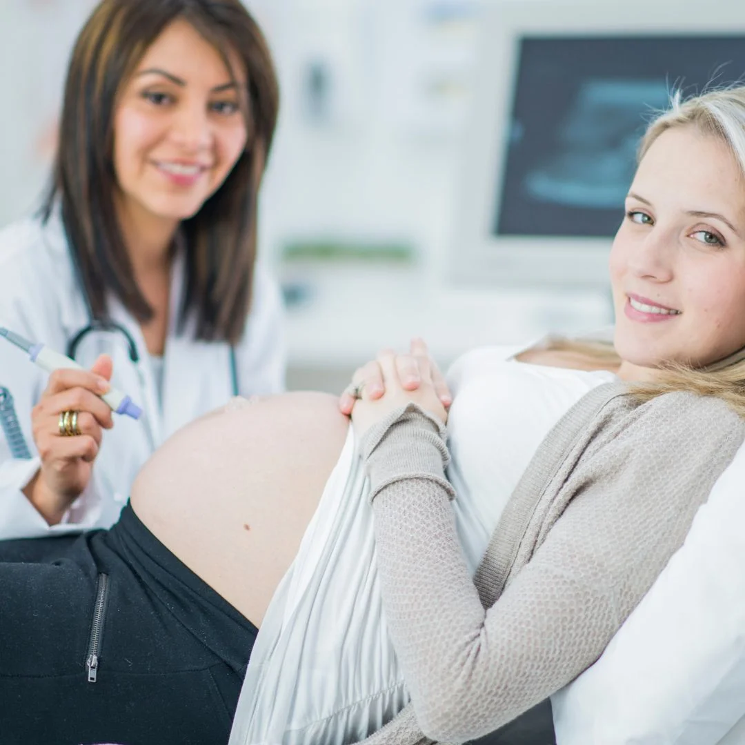Why Choose Sweet Baby Face for My 3D Ultrasound-1080x1080-Image 3 Woman and doctor smiling while getting an ultrasound
