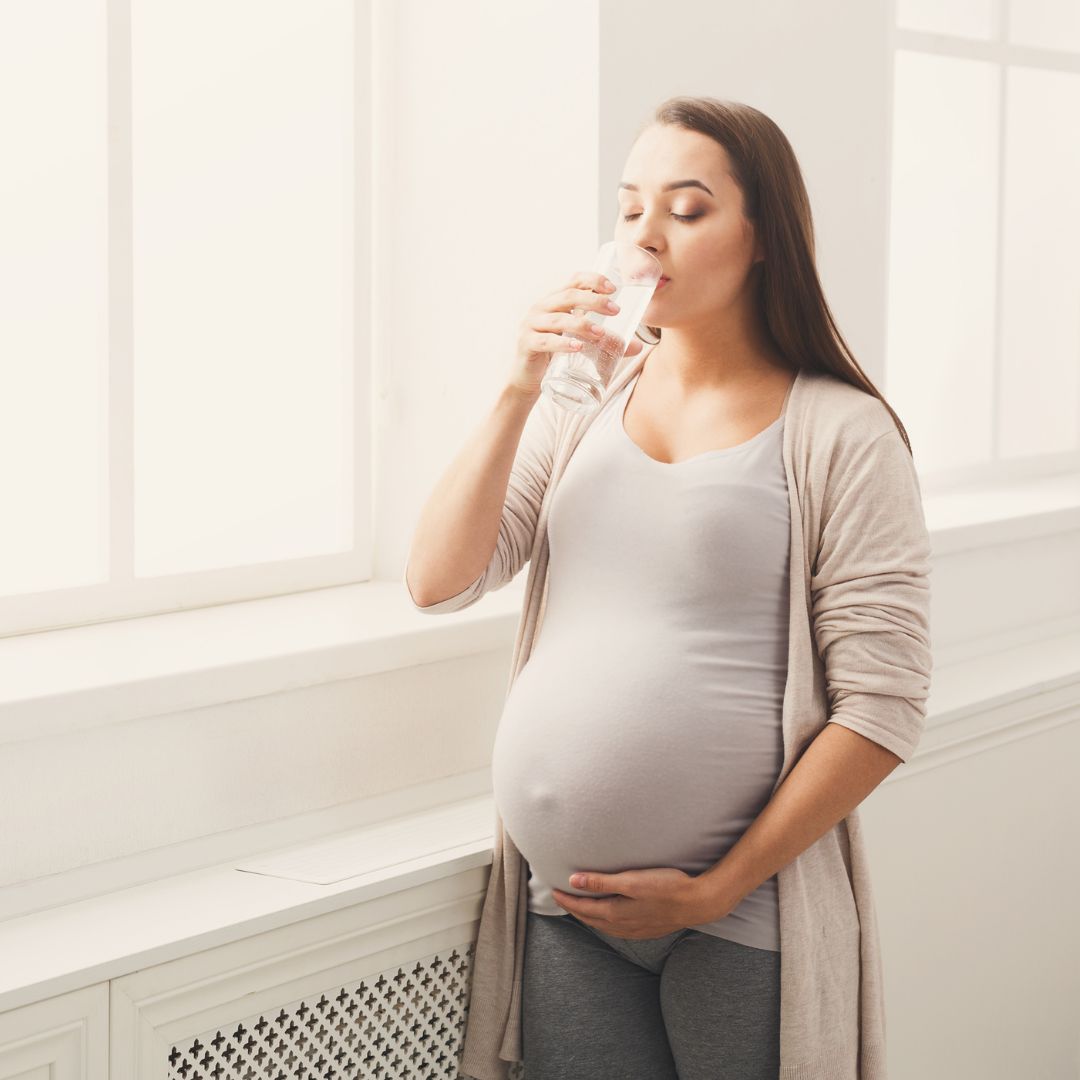 pregnant woman drinking water Tips To Prepare For Your Ultrasound